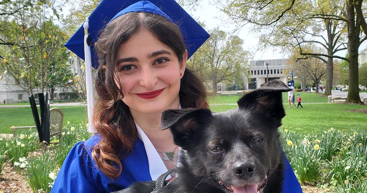 AU Diplomat Lori Graduation with Dog