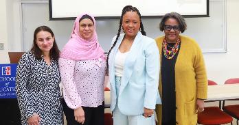 Dr. Cheyenne Batista (second from right) stands with (from left) Dr. Samantha Cohen, Dr. Amaarah DeCuir, and Dean Cheryl Holcomb-McCoy.