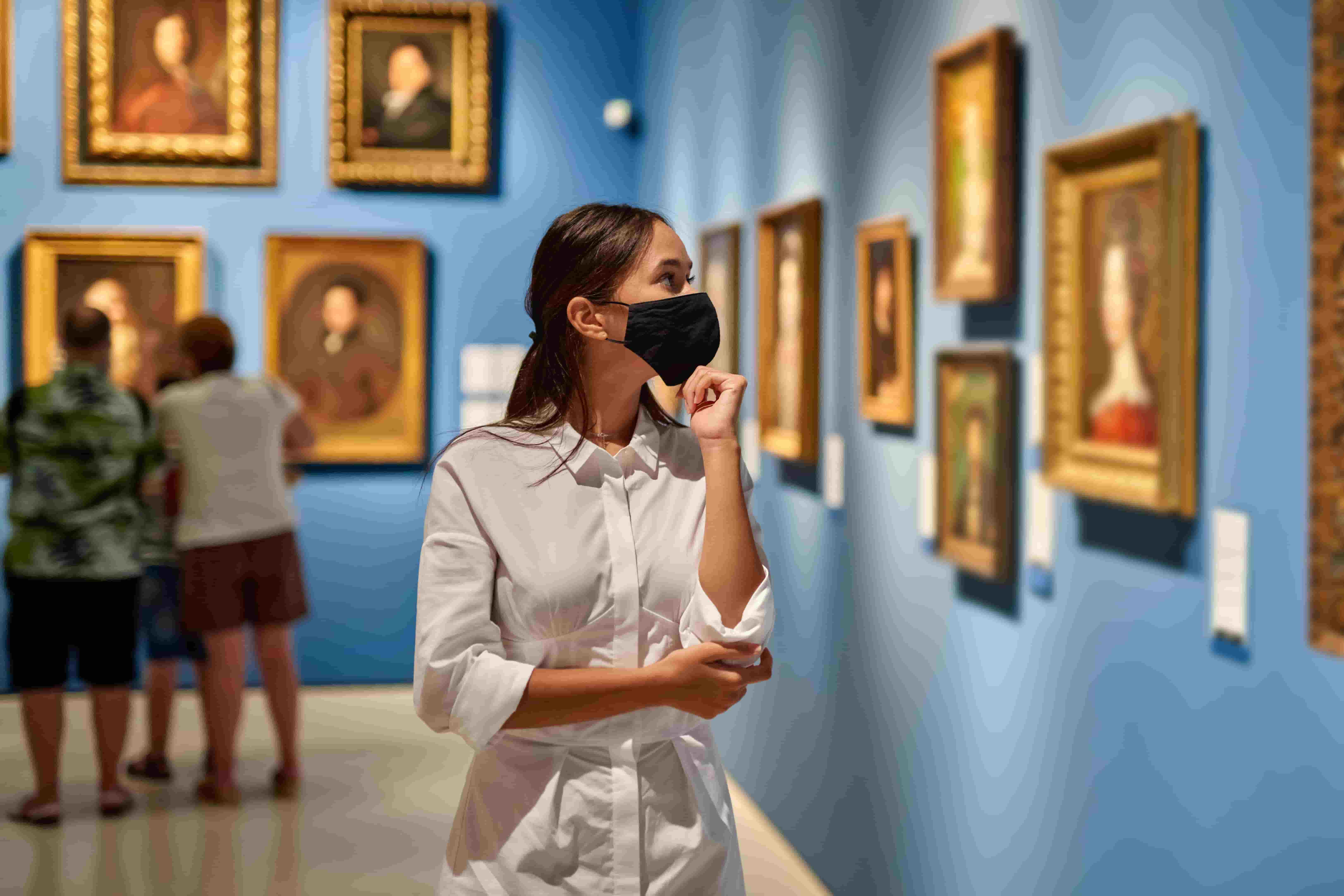 Person viewing a museum exhibition