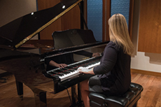 Woman at piano