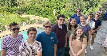 AU students pause to smile during their tour of the Dumbarton Oaks gardens.