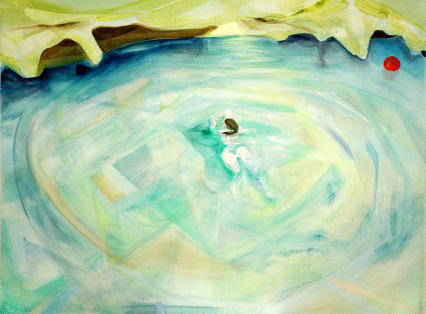 The small figure of a woman swims in a pool of green and blue