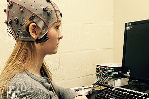 Student in EEG device