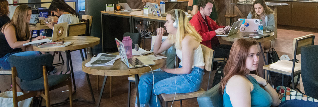 Students talk and study in the Bridge Cafe