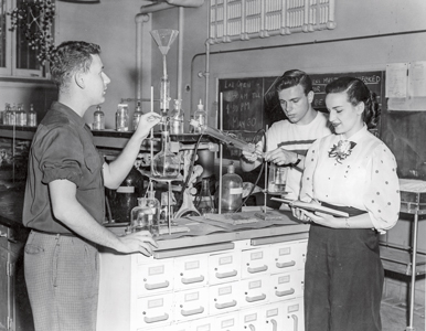 students in a science lab in the 1950s
