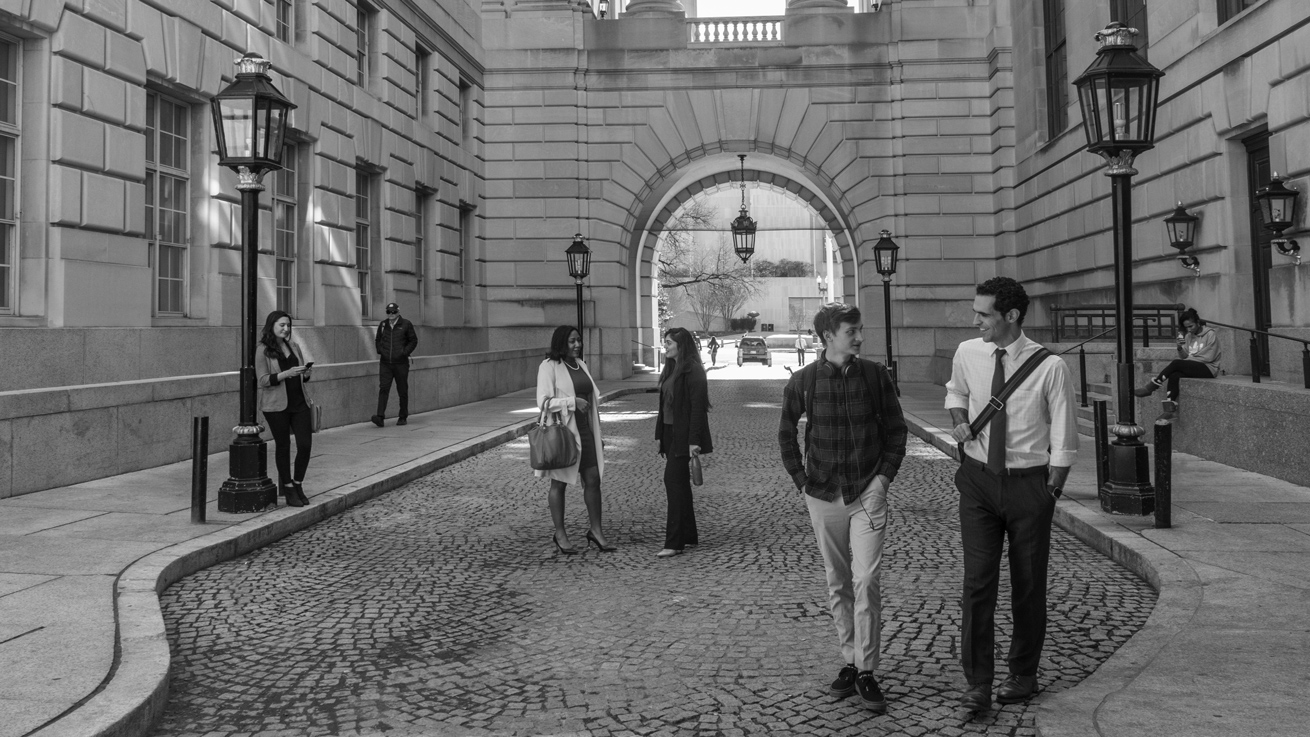 alumni walk around the Ronald Reagan Building and International Trade Center