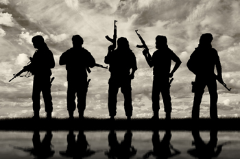 Five terrorists silhouetted against a cloudy sky
