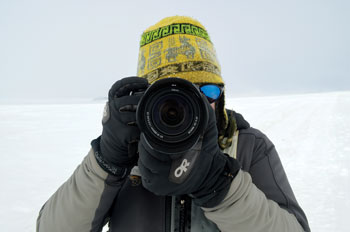 mike lucibella points his nikon at the camera in Antarctica