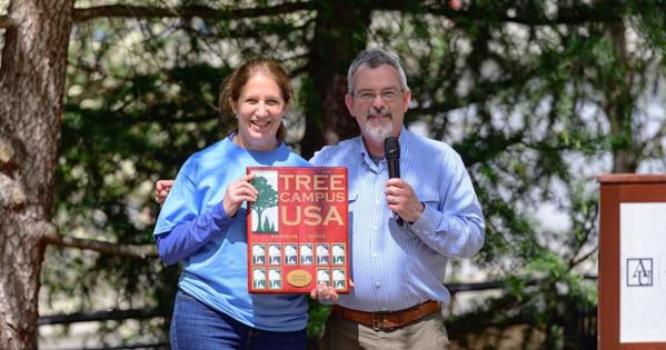 President Sylvia Burwell accepts the Tree Campus USA designation for the 14th year. Photo by Jeff Watts. 