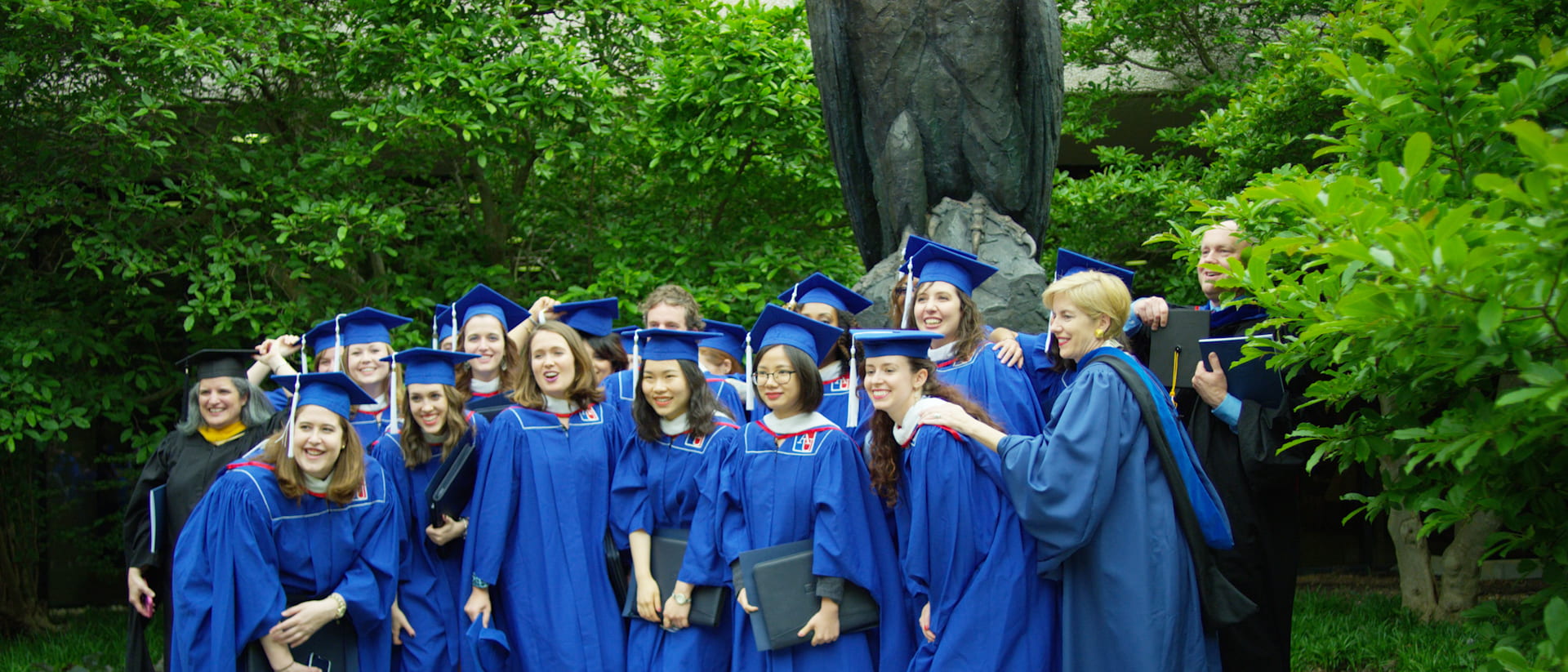 Eagle statue with graduates