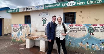 SIS students Sophie Cazares and Leo Jaques at a UNICEF-installed wash station
