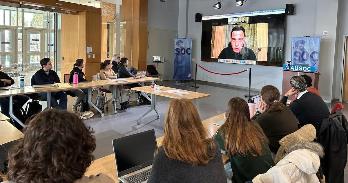 Trey Yingst speaks to students via Zoom from Kyiv