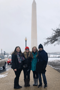Molly with friends in front of Washington Monument