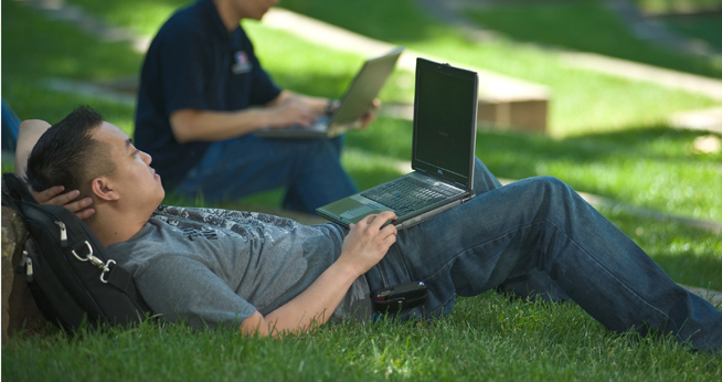 AU Student Enjoying Outdoor Wireless