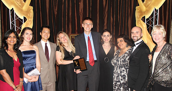 SOC students win Emmy for "Ecoviews" R-to-L: Ansu John, Eileen Keegan, Kai Fang, Shanon Sparks, Nate Brigham, Jessica DiBartolomeo, Aditi Desai, Anthony Brenneman, and Prof. Sandy Cannon-Brown.