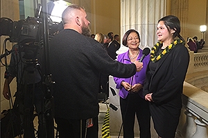 Sierra Schmitz gives a TV interview at the State of the Union address. 