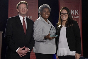 A photo of campaign strategist Donna Brazile accepting the 2016 Wonk of the Year award at American University.