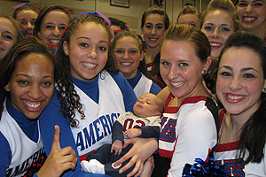 AU Spirit Program Cheerleaders and Dance Team babysit an Eagle in training.