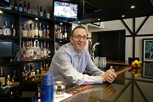 Chris Nardelli behind the bar at Blue44