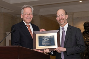 SPA Professor Jon Gould accepts the Administration of Justice Award.