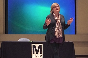 Lynn Bowersox speaking at a Metro event