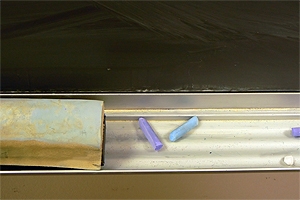 blackboard with chalk and eraser