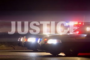 The word Justice superimposed on two police cars