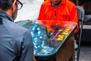 Two young men play pacman at the Game Lab sponsored Indie Arcade event
