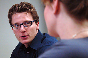 Professor Matt Nisbet talks to a student