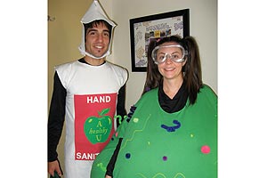 Matthew Barresi, left, dressed as a bottle of hand sanitizer and Ashleigh Enriquez garbed as a dreaded germ.