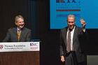 Nieman curator Bob Giles, left, smiles as Jon Alpert displays his I.F. Stone Medal.
