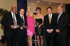 From left: Thomas Lewis, SPA/BA ‘75; Robert Cerasoli, SPA/BA '69; Miss D.C. Jen Corey, CAS/BA '09; SOC/BA ‘03; AU President Neil Kerwin; and Brian Keane, SPA/BA ‘89.