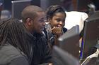 Photo: Brandon Warren and Tamesha Veasley work on the EverFi Financial Literacy Program at the new Kogod School of Business Financial Services and Information Technology Lab.