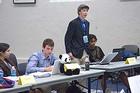 Students in Community of Scholars' conflict resolution class participate in a model UN security council meeting.