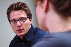 Professor Matt Nisbet talks to a student