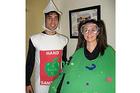 Matthew Barresi, left, dressed as a bottle of hand sanitizer and Ashleigh Enriquez garbed as a dreaded germ.