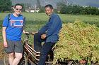 Katie near Lijiang, China with a local Naxi farmer.