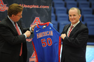 Neil Kerwin and Billy Walker hold an American University jersey