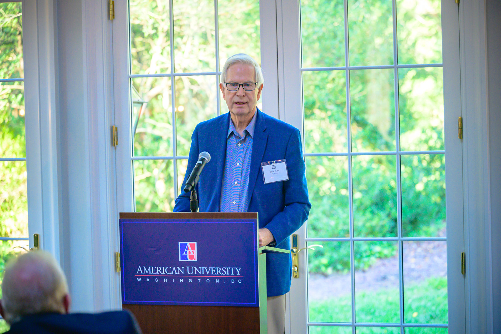 54747708957_dc36f8a6c1_h Ambassador Clyde Taylor speaks from the podium.