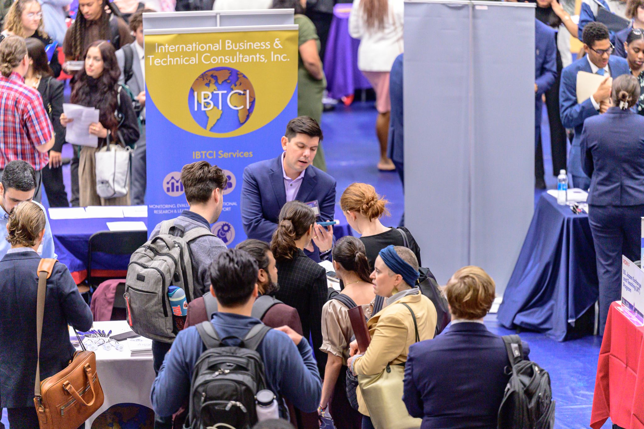 1726858780330 Alumni and students at a job fair.
