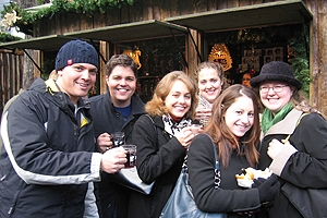 Students gather at an outdoor winter market