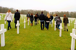 Students touring the Ardennes graveyard
