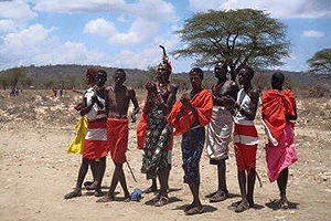Kenyan Samburu men in their traditional colorful costumes.