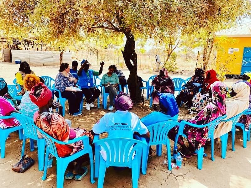 Meeting with local group outdoors.