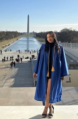 Sydney North at the DC mall in AU graduation gown.