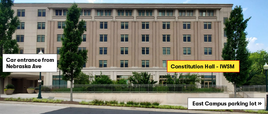 Elevation of Constitution Hall from the interior of East Campus that shows the car entrance, entrance to Constitution Hall, and parking lot