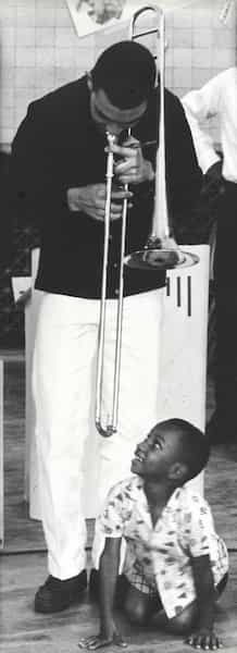 Joel Jacobson, Trombonist (unidentified) at Marie Reed Elementary School for a special program hosted by The New Thing, 1969. Photograph, 10 inches x 28.5 inches. Courtesy of Joel Jacobson and Jackson Reed High School.