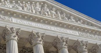Supreme Court pediment with nine figures, inscription reads "equal justice under law"