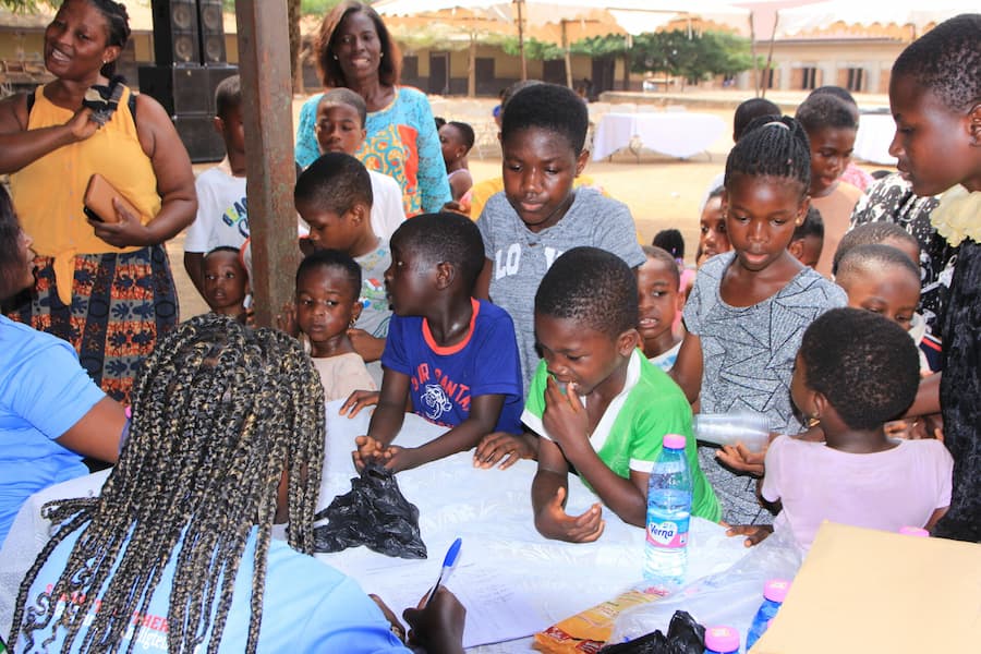 Students at a healthcare event sponsored by Stand Together Ghana 