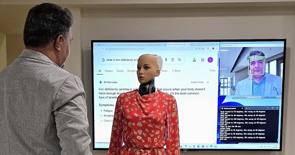Iris interacting with creator Aref Zahed 